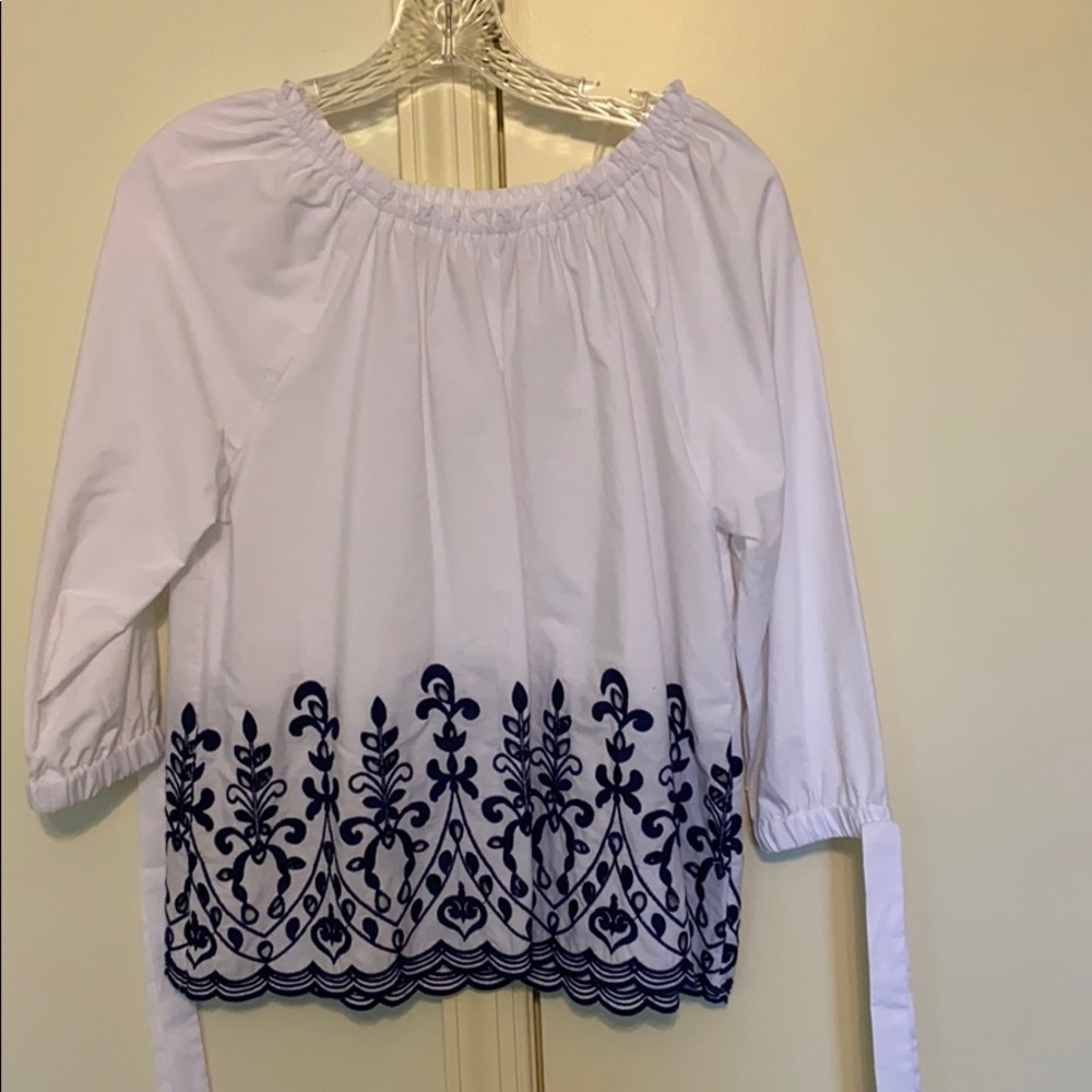 White and navy off the shoulder blouse